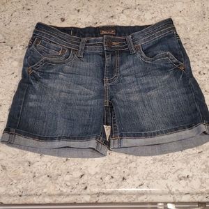 Denim shorts. 6 inch inseam. Stretchy. Med wash